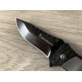 Нож Browning в разгънато състояние върху дървена повърхност Ергономична дръжка на ножа Browning с противоплъзгаща текстура