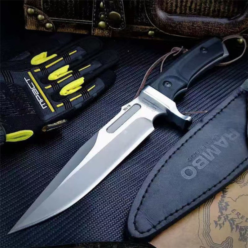 Детайл на острието и канията с надпис RAMBO – First Blood Ловен нож Rambo First Blood с черна дръжка и остър връх