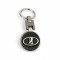 Метален ключодържател с въртяща връзка и черна кръгла емблема - Символ на стабилността