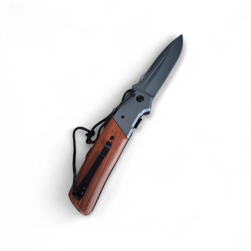 Дървена дръжка и въженце за захващане на нож Browning Нож Browning върху мраморен фон с метална линийка за размер