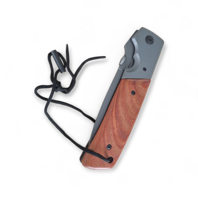 Дървена дръжка и въженце за захващане на нож Browning Нож Browning върху мраморен фон с метална линийка за размер