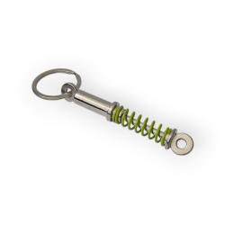 Ключодържател с амортисьор – метал и зелена пружина - Сила в движение