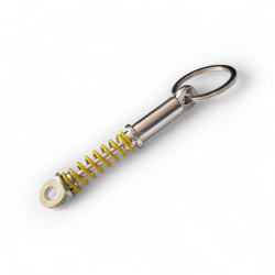 Ключодържател амортисьор с жълта пружина – метален модел  - Енергия в джоба