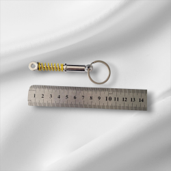 Ключодържател амортисьор с жълта пружина – метален модел  - Енергия в джоба