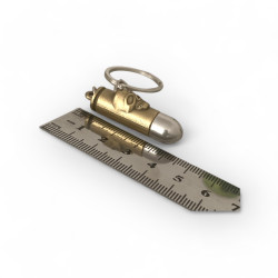 Метален ключодържател куршум с релефен череп – бронзов дизайн, 5.5 см  - Куршум на съдбата