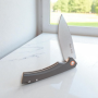 Черен нож Onyx Arms с D2 стомана и G10 дръжка Сгъваем нож Onyx Arms с отворено Drop Point острие