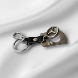 Метален ключодържател с кожена каишка и въртящ се елемент   Символ на движение