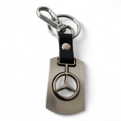 Метален ключодържател с кожена каишка и въртящ се елемент   Символ на движение