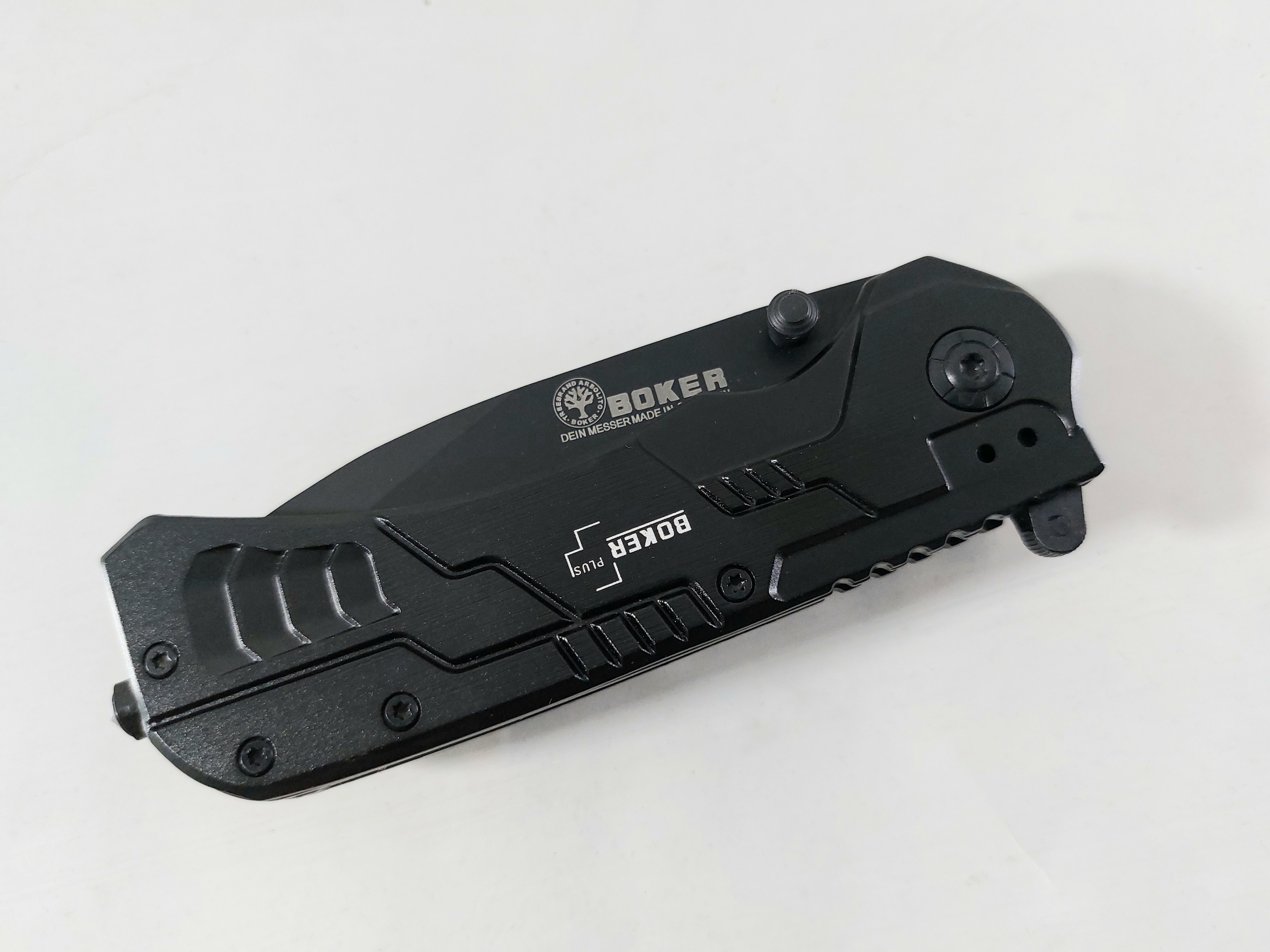 Сгъваем автоматичен масивен джобен нож една втора серетирано острие - Boker B073