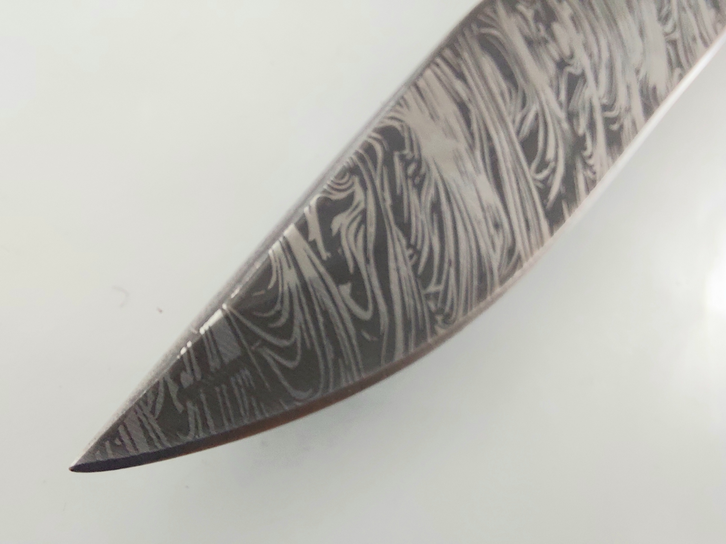 Руски ловен нож с кания шарка имитираща дамаската стомана