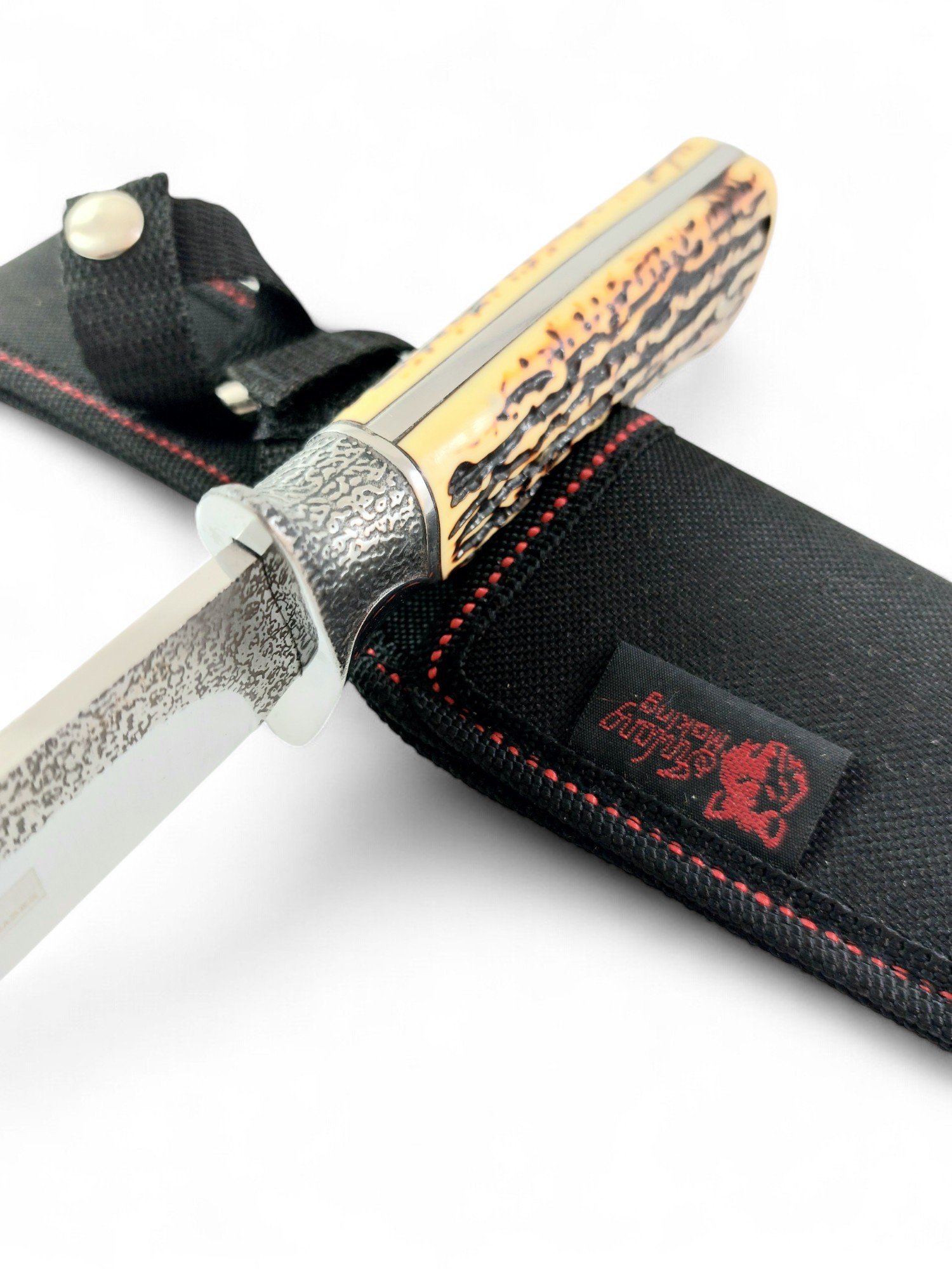 Близък план на острието с гравировка Columbia Hunting Company