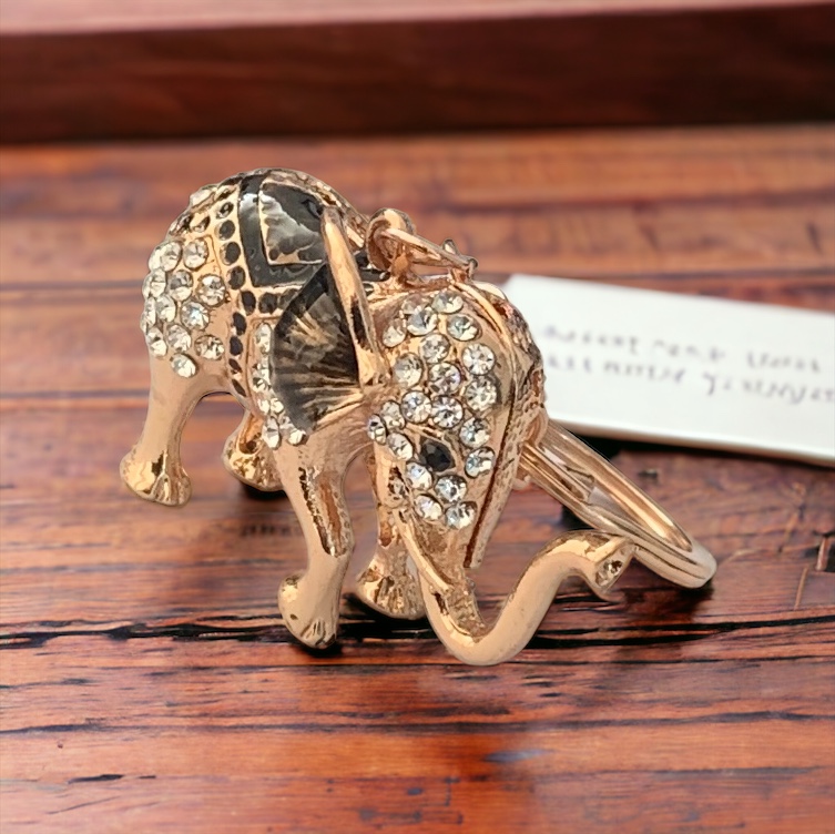 Елегантен аксесоар с розово златен слон с кристални украшения